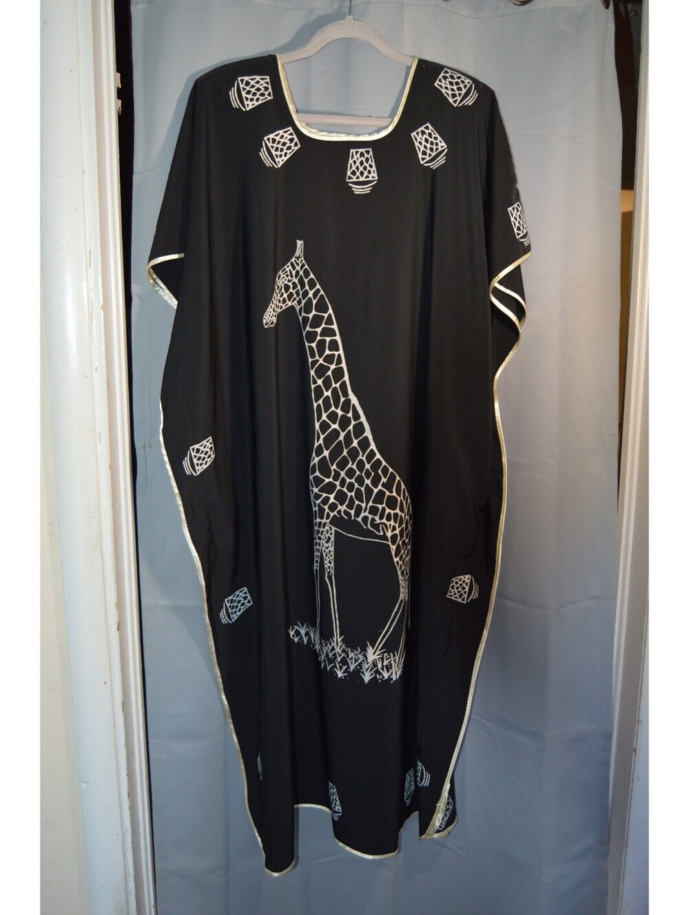 Black giraffe print caftan dress